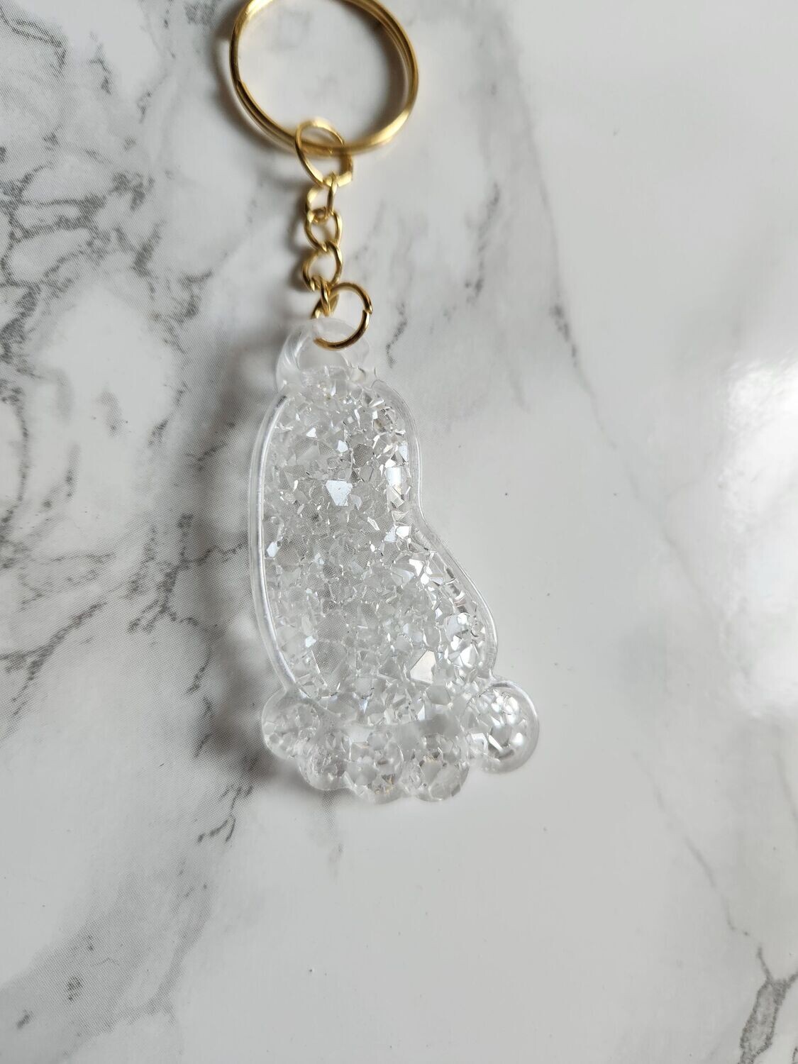 Porte clé pied de bébé effet diamant