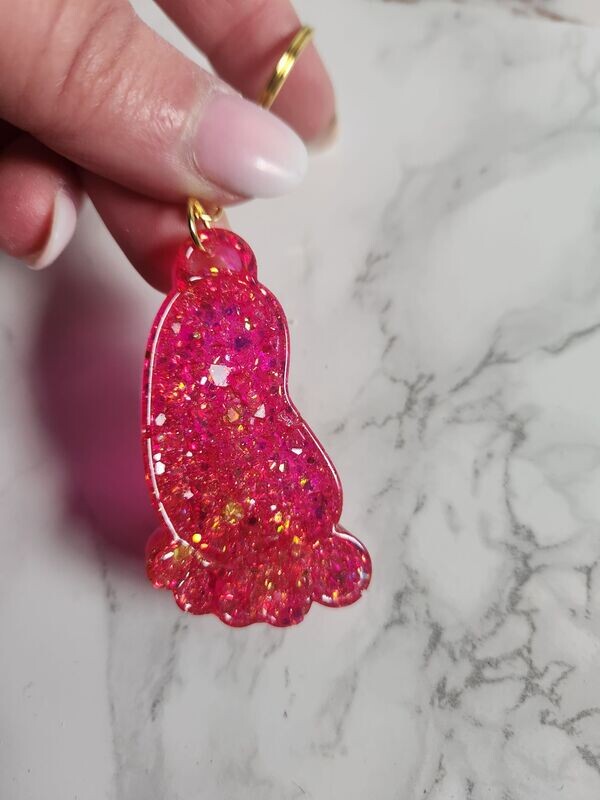 Porte clé pied de bébé rose foncé pailleté effet diamant