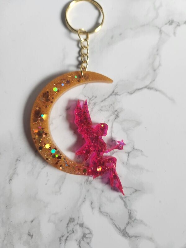 Porte clé Fée sur lune rose et or pailleté