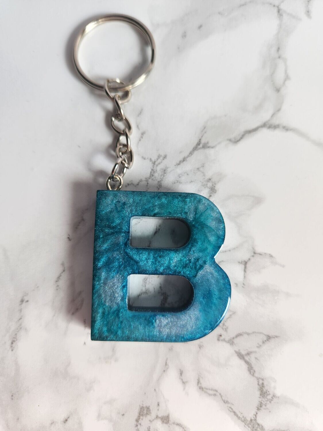 B turquoise marbré