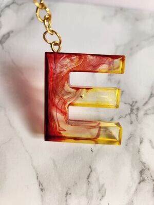 E encre alcool rouge et jaune