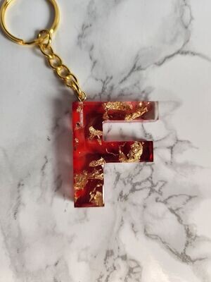 F rouge feuilles d'or