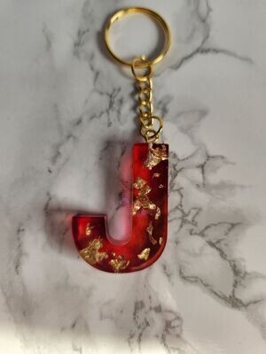 J rouge feuilles d'or