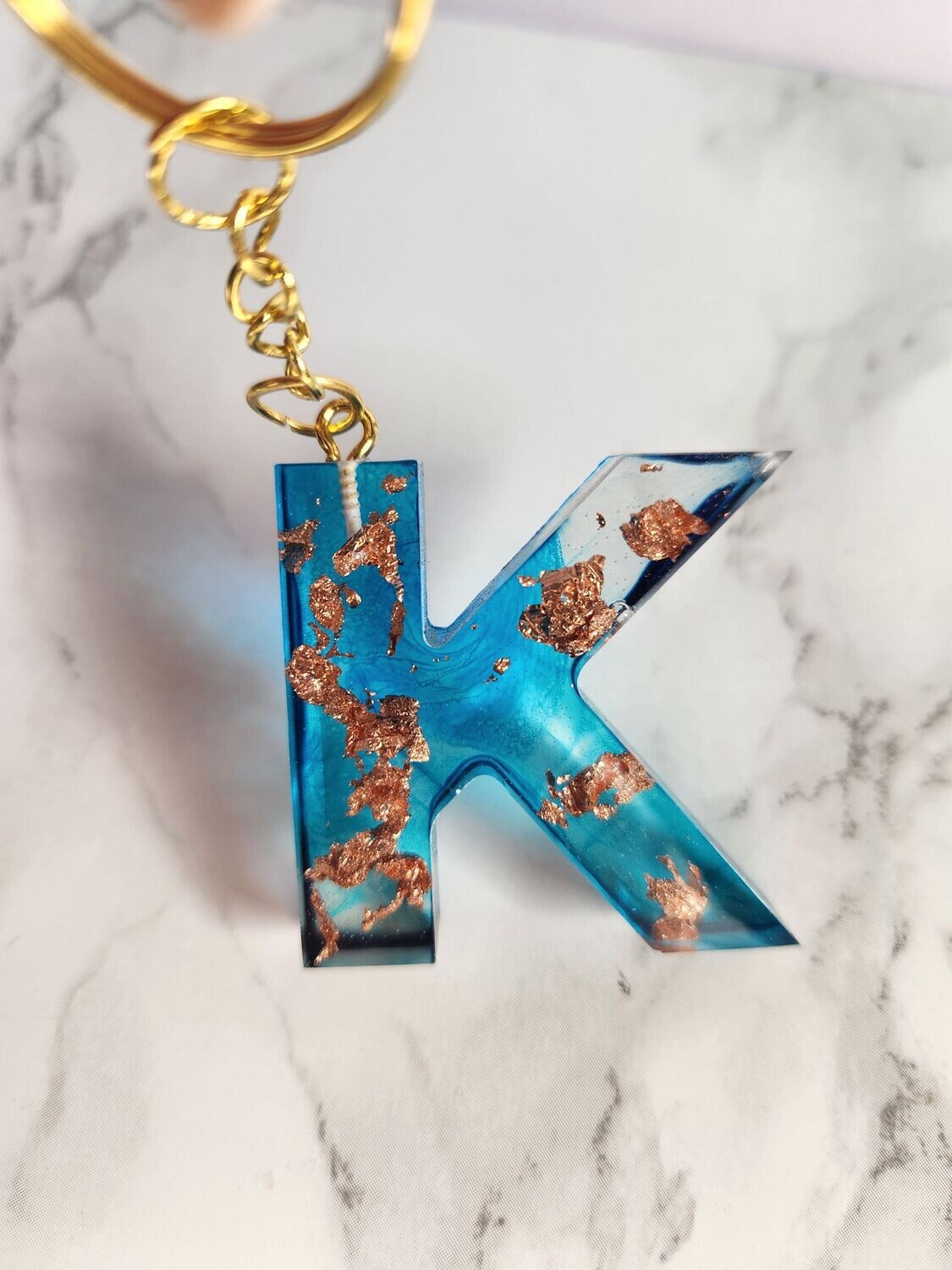 K turquoise feuilles de bronze