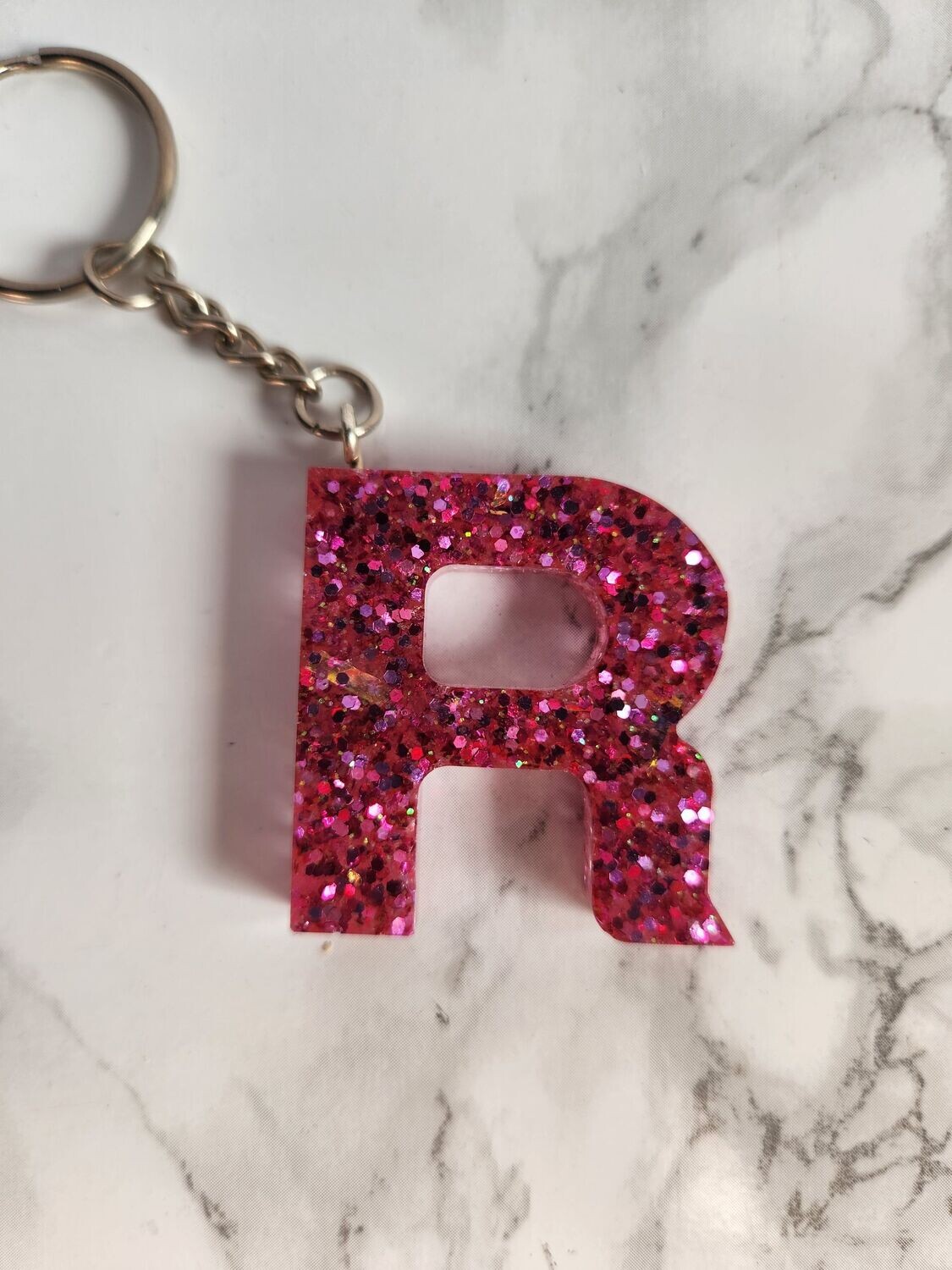 R rose foncé pailleté