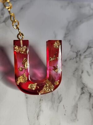 U encre alcool rose rouge feuilles d'or