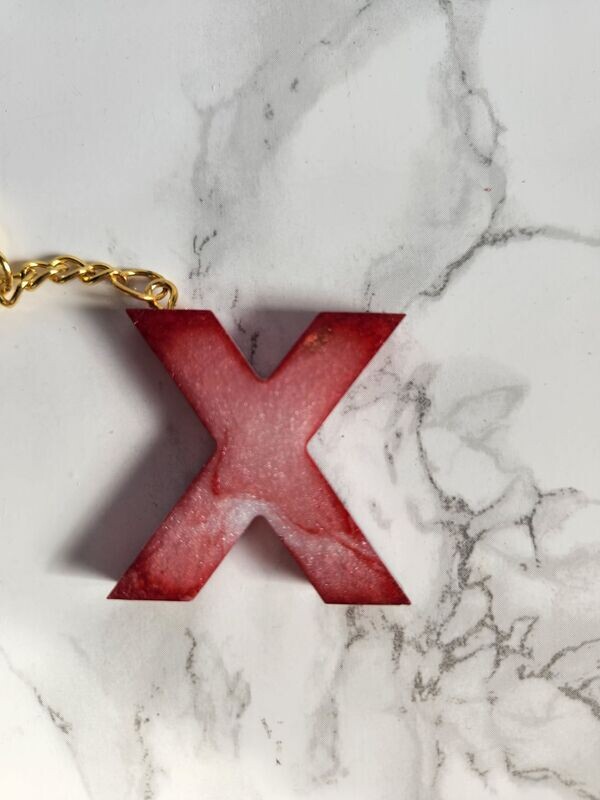 X marbré rouge et blanc