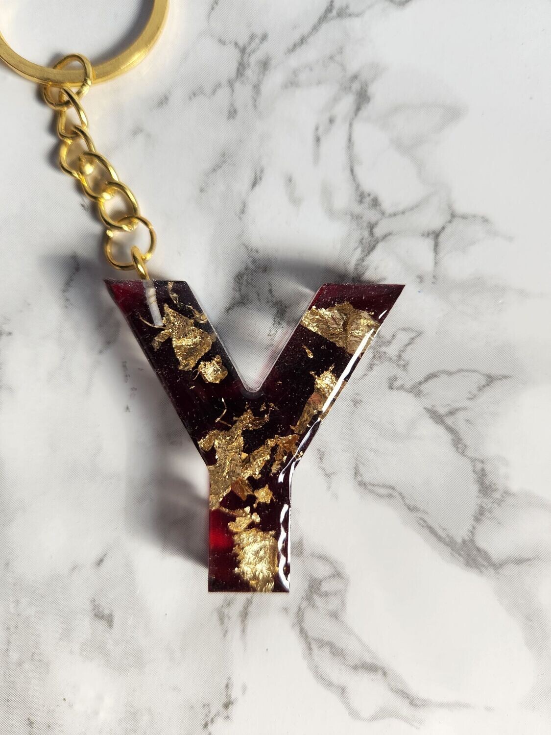 Y rouge foncé feuilles d'or