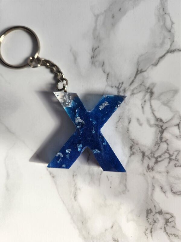 X bleu feuilles d'argent