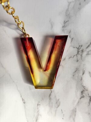 V encre alcool rouge et jaune