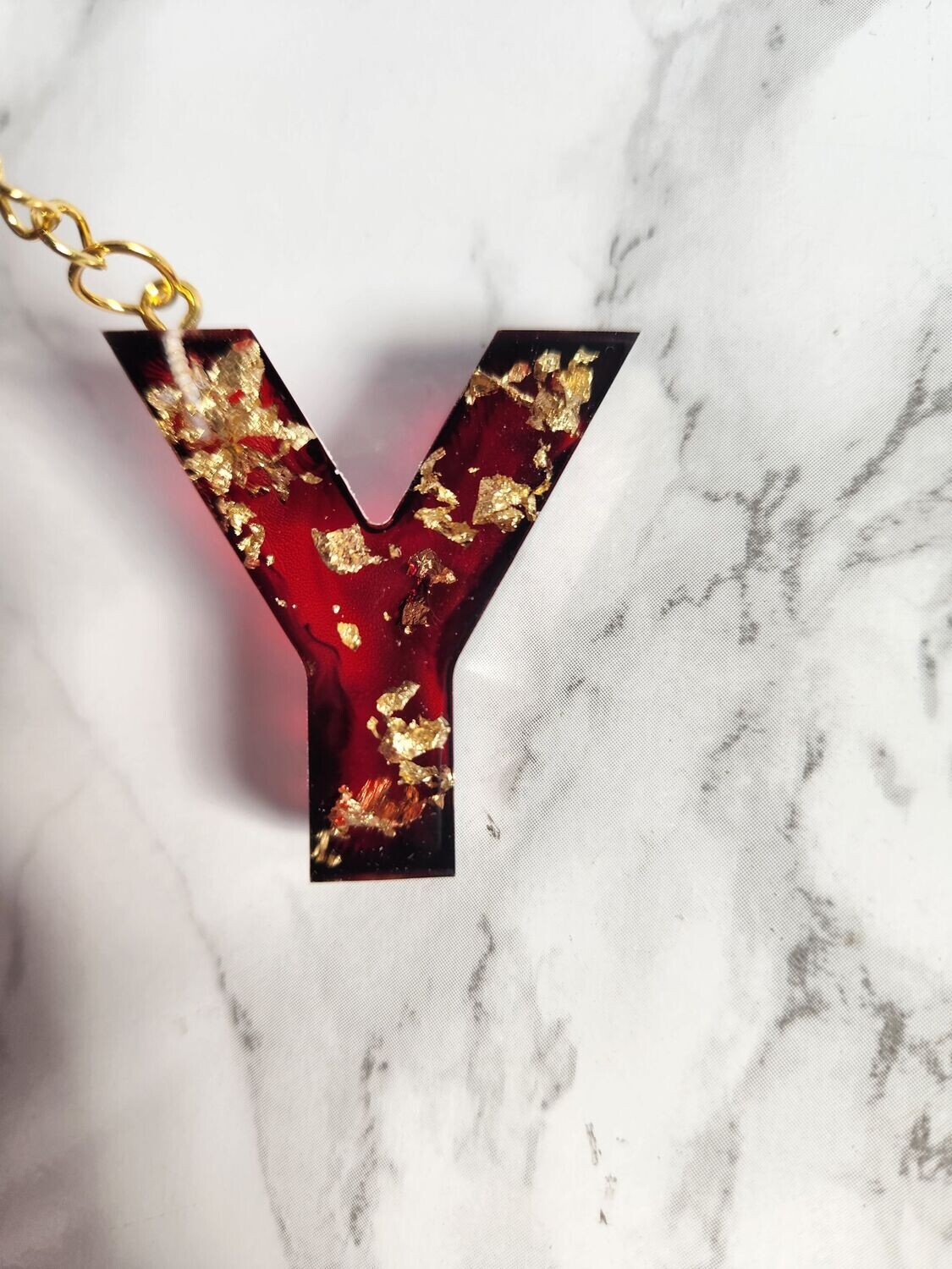 Y rouge et noir feuilles d'or