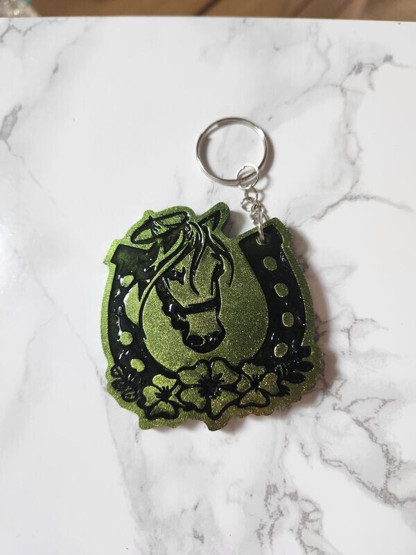 Porte clé Fer à cheval vert doré et noir