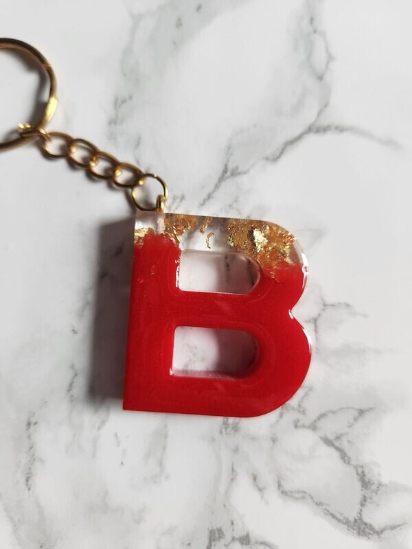 B rouge foncé feuilles d'or