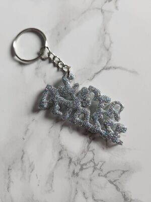 Porte clé super pétasse pailleté holographique