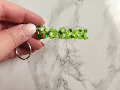 Porte clé bombasse paillettes vertes holographiques