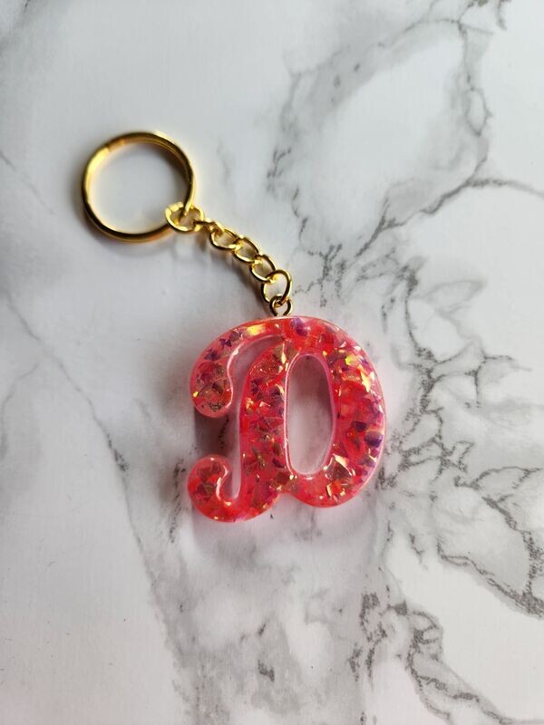 D script rose confettis dorés