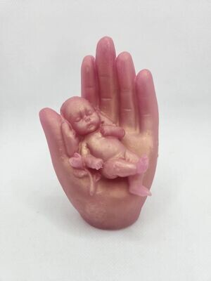 Main avec bébé rose gold