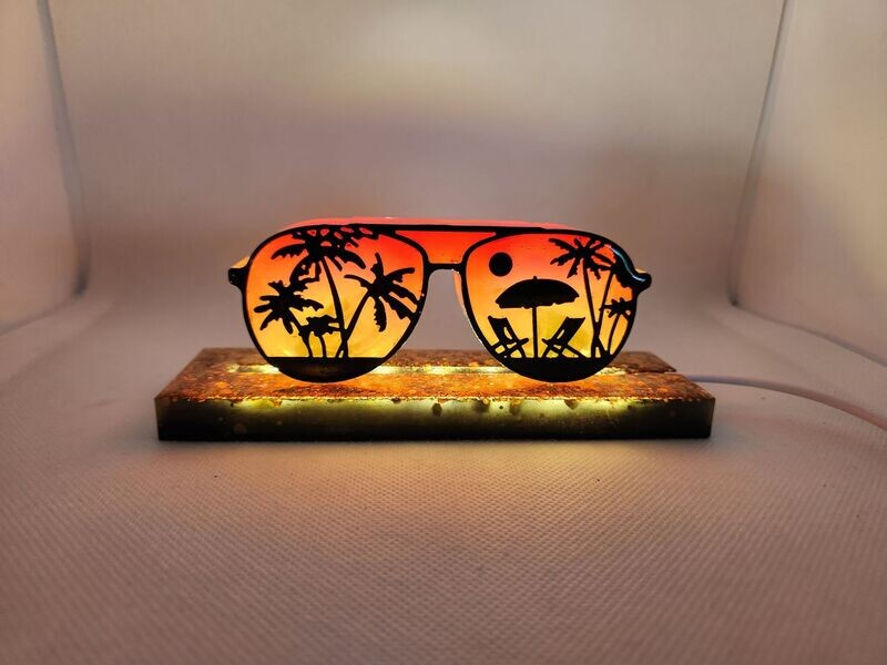 Veilleuse lunettes  de plage sur socle lumineux