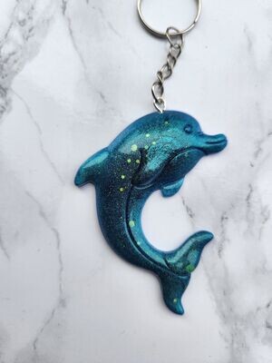 Porte clé dauphin bleu caméléon pailleté