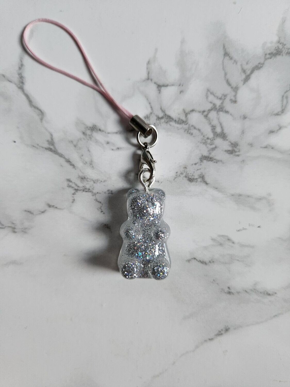 Bijou bonbon ourson argent pailleté cordon rose