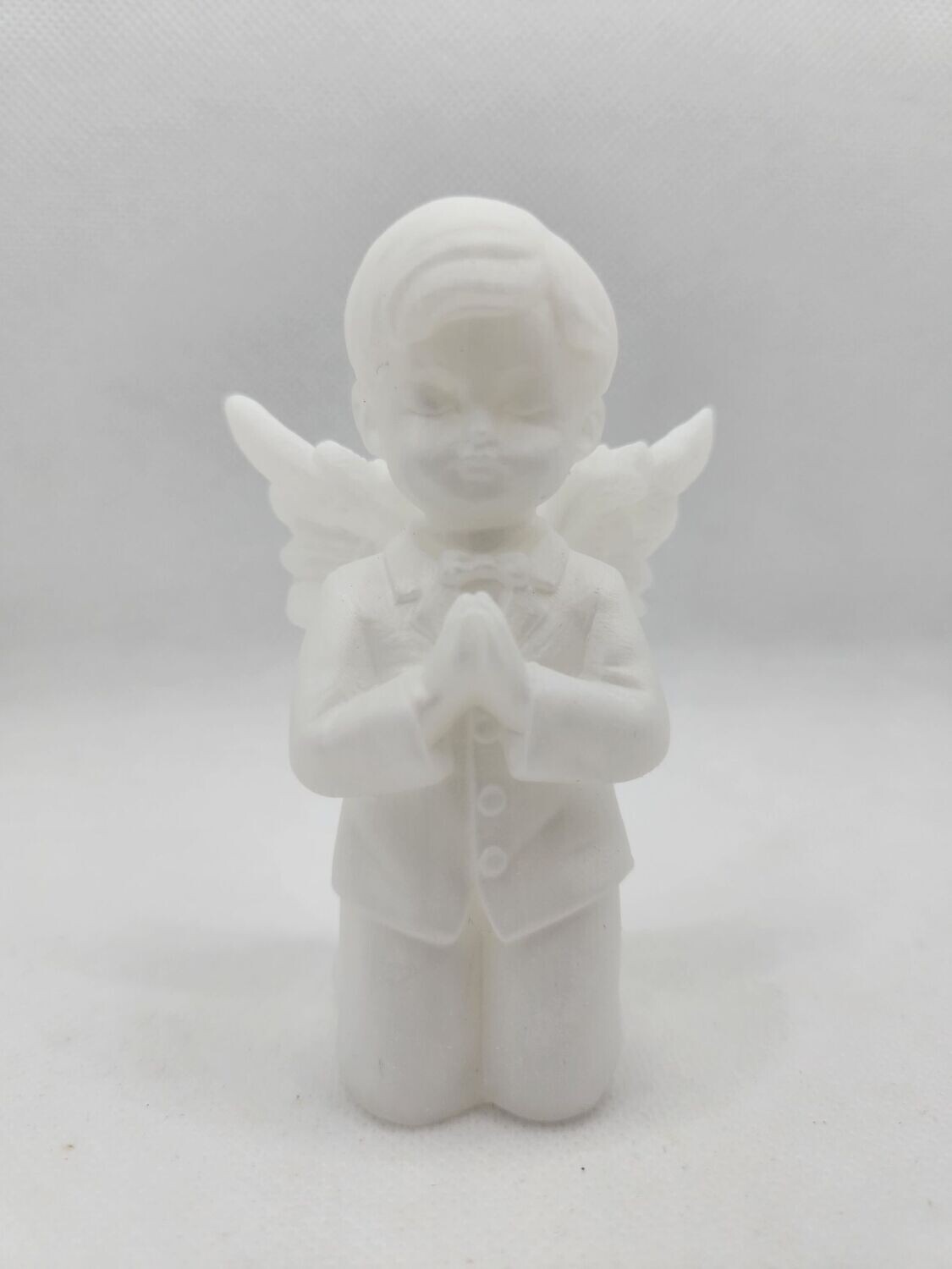 Ange garçon blanc nacré