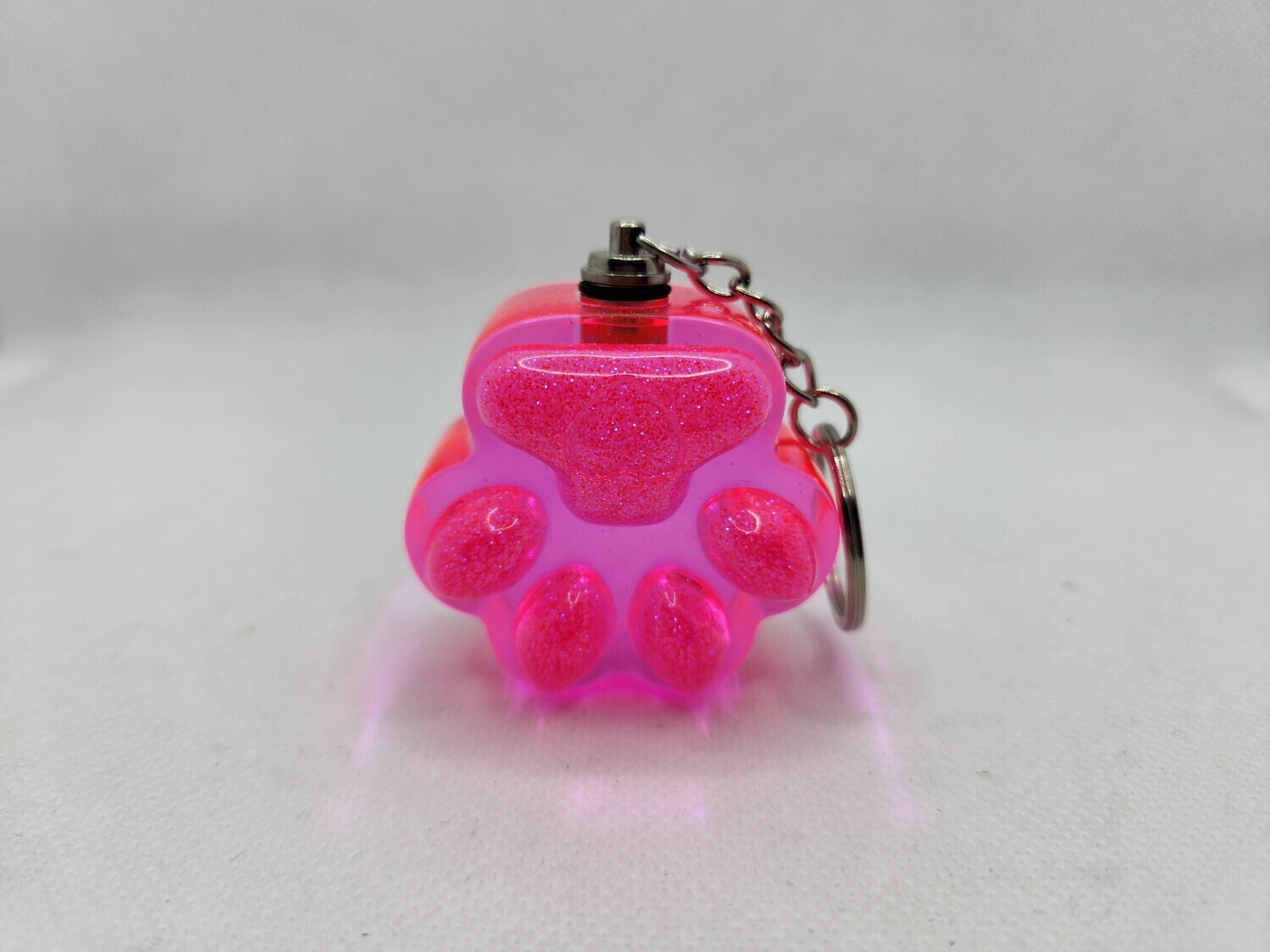 Patte rose pailleté lumineuse XL