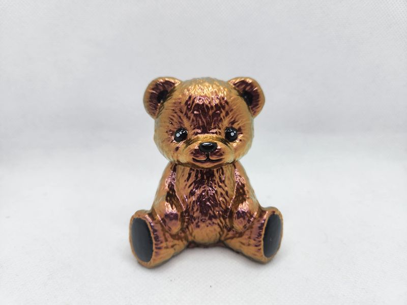Ourson teddy assis caméléon violet cuivré