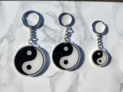 Porte clé rond yin yang à personnaliser Porte clé rond yin yang à personnaliser
