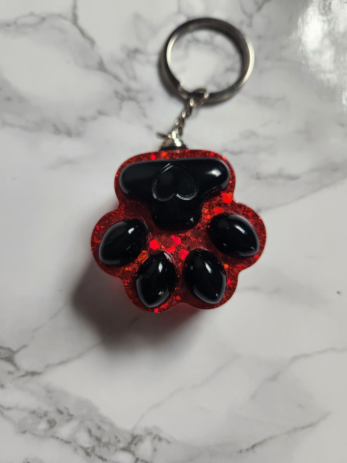Patte rouge pailleté et noir lumineuse XL