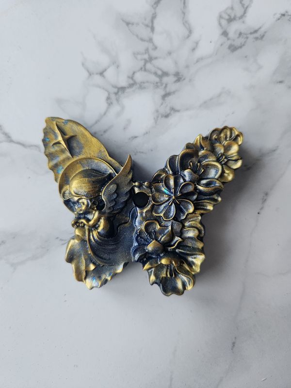 Ange papillon bleu et or