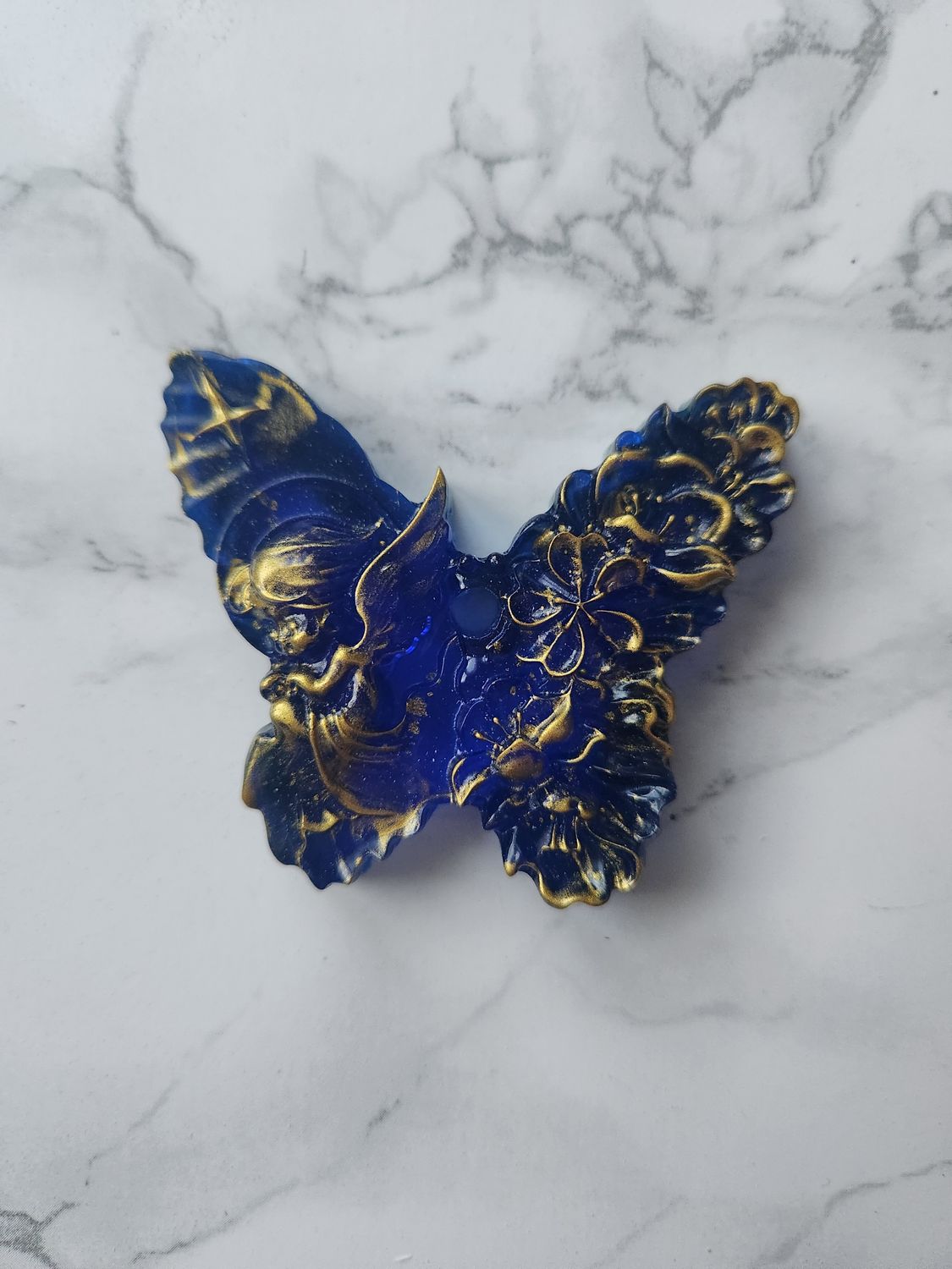 Ange papillon bleu et or translucide