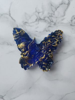 Ange papillon bleu et or translucide