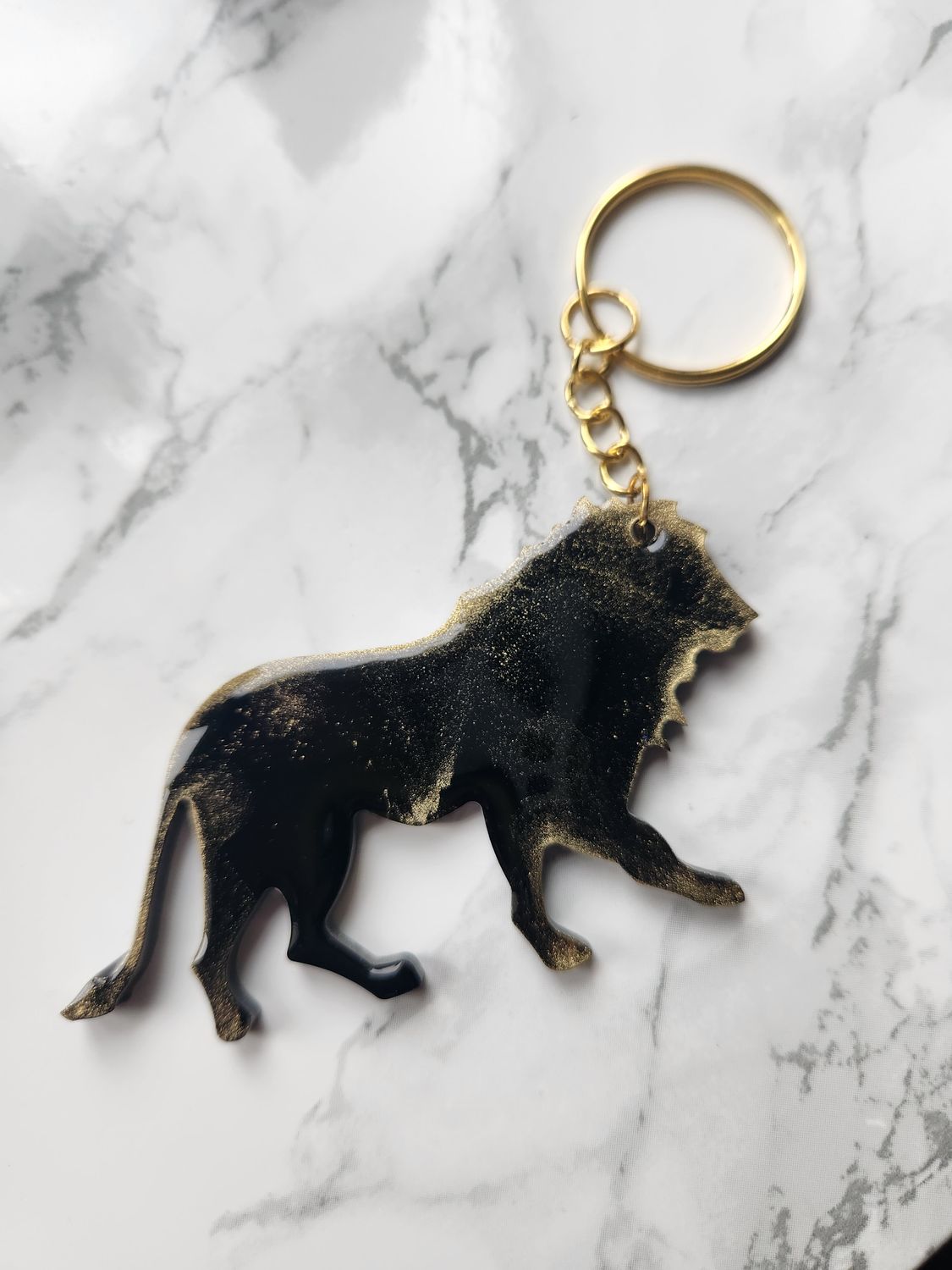 Porte clé Lion noir et or antique
