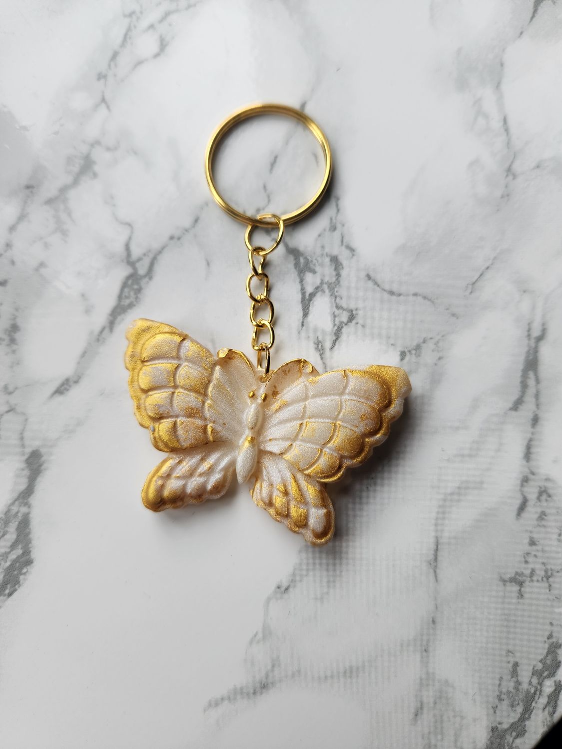 Porte clé Papillon blanc et or