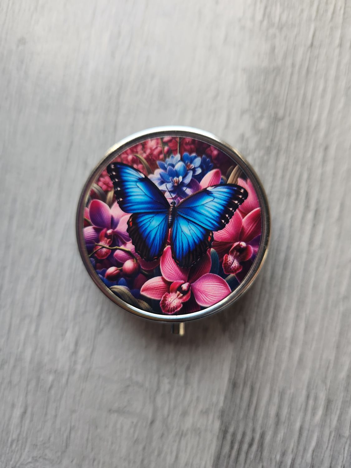Pilulier modèle papillon bleu