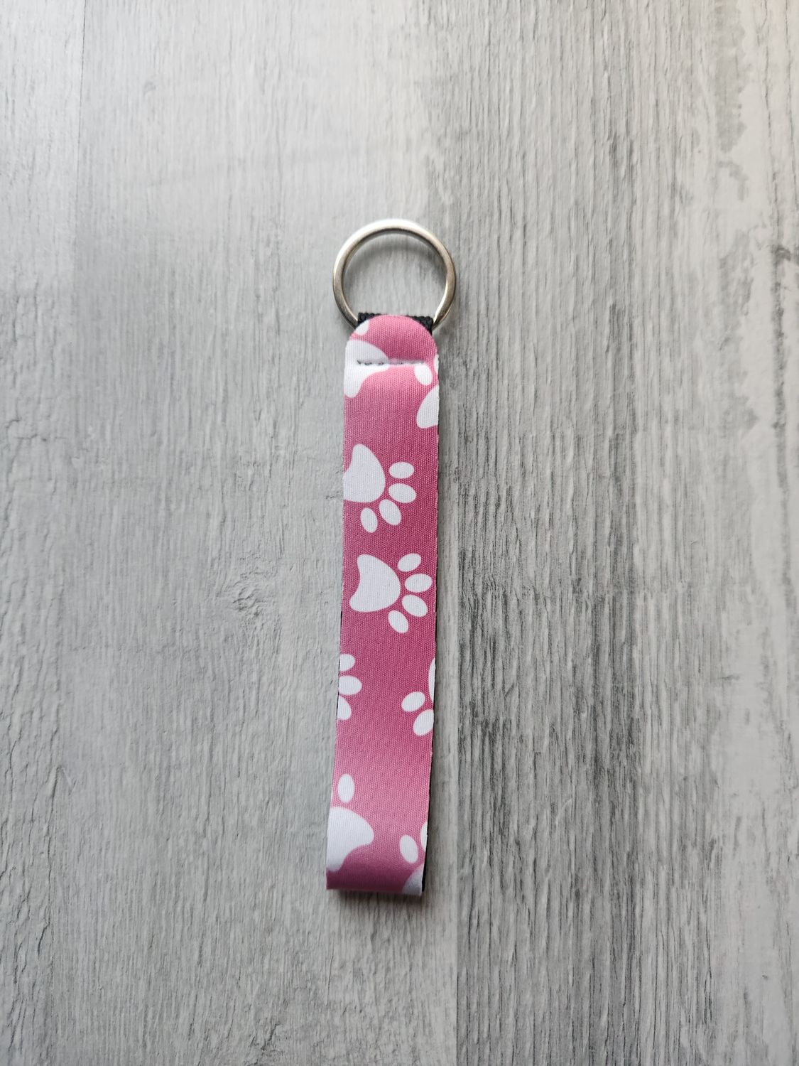 Porte clé lanière pattes de chien dégradé rose vert