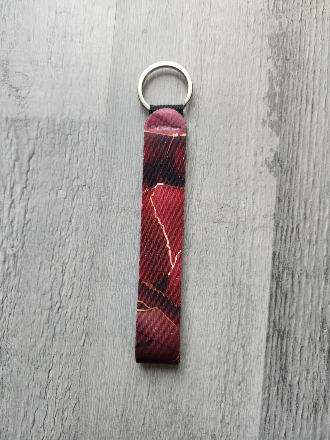 Porte clé lanière marbré bordeaux