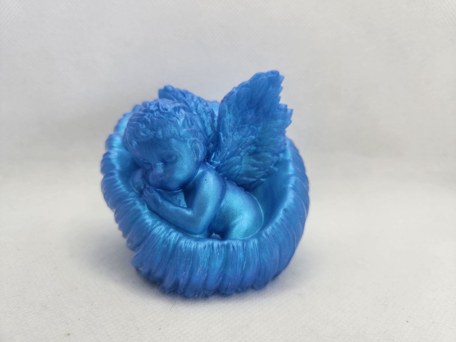 Ange endormi bleu / vert caméléon