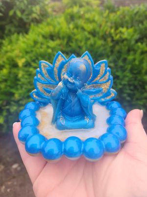 Bouddha lotus bleu et or sur son socle bubulles