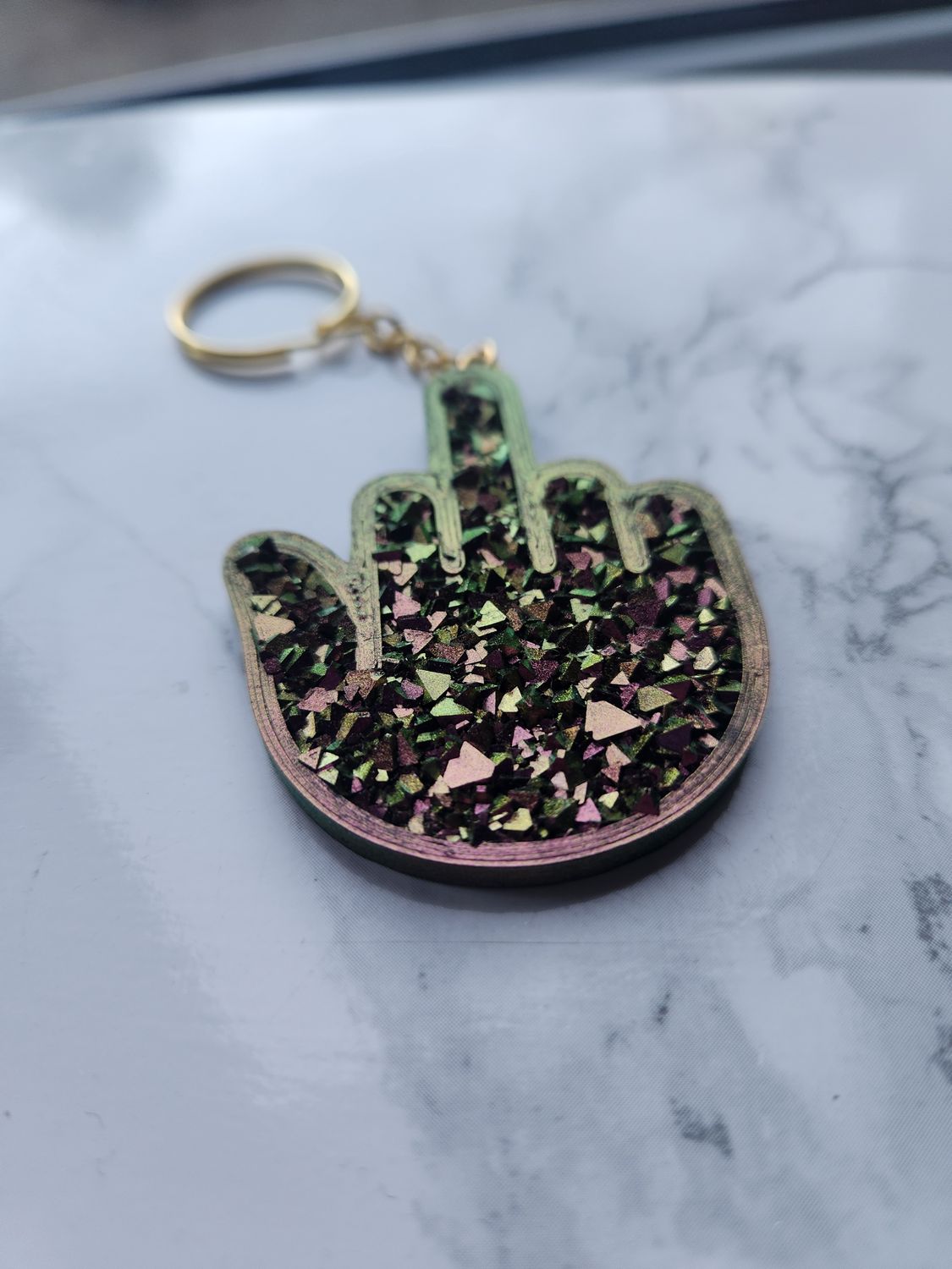 Porte clé fuck violet vert caméléon