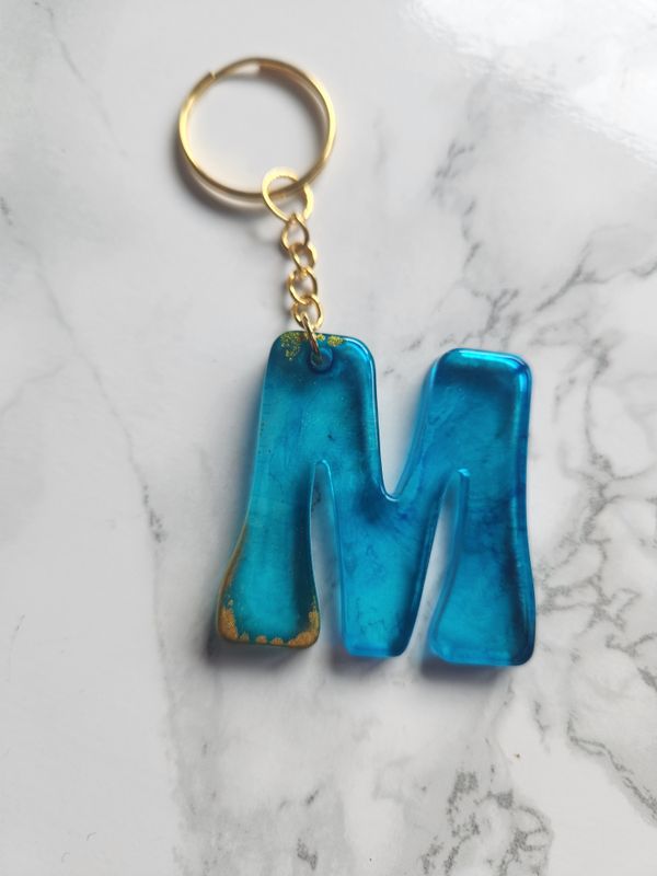 M encore alcool bleu et or