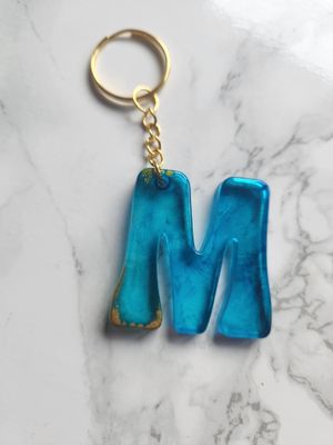 M encore alcool bleu et or