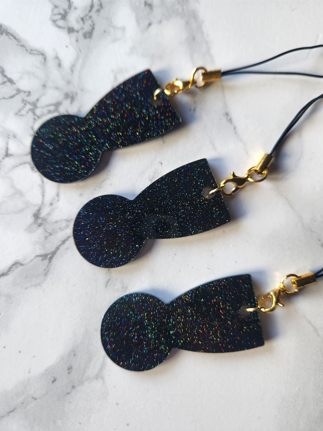 Jeton de caddie pailleté noir holographique