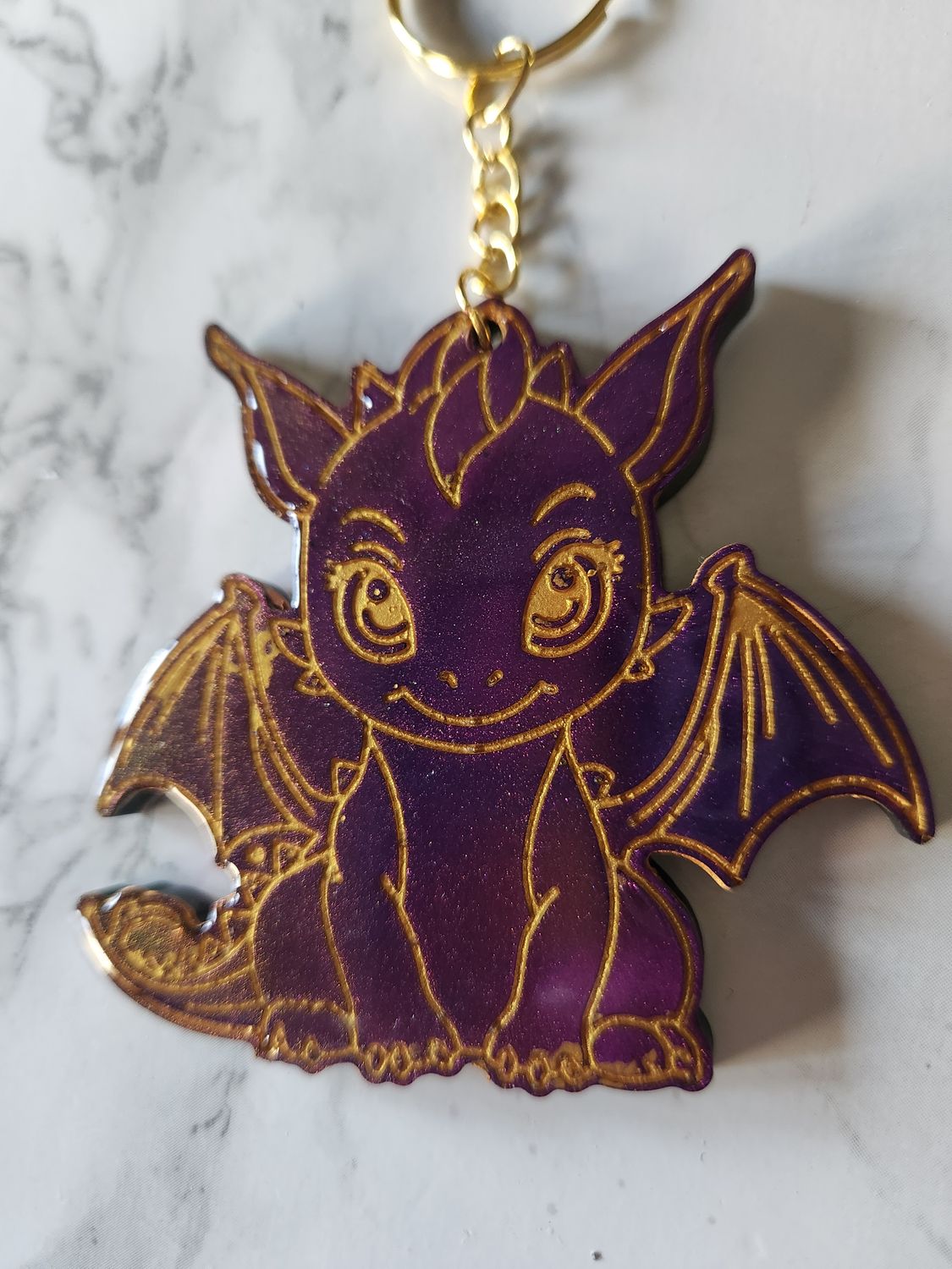 Porte clé dragon caméléon violet doré
