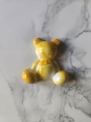 Ourson assis marbré jaune