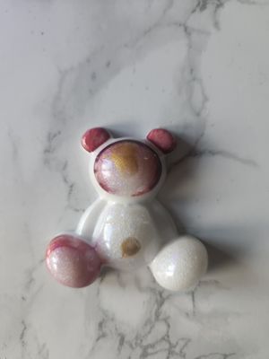 Ourson assis astro blanc, rouge et or Ourson assis astro blanc, rouge et or