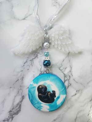 Suspension ailée foetus Suspension ailée foetus