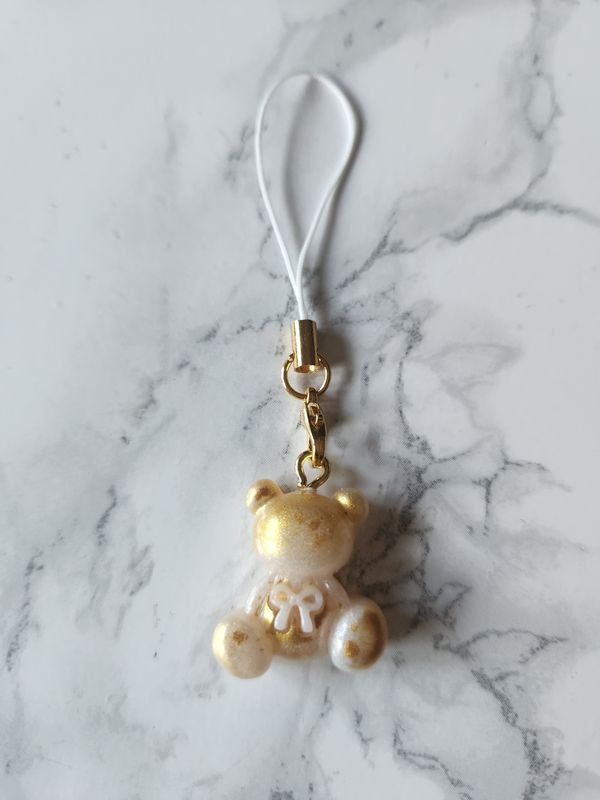 Bijou mini ourson noeud blanc et or