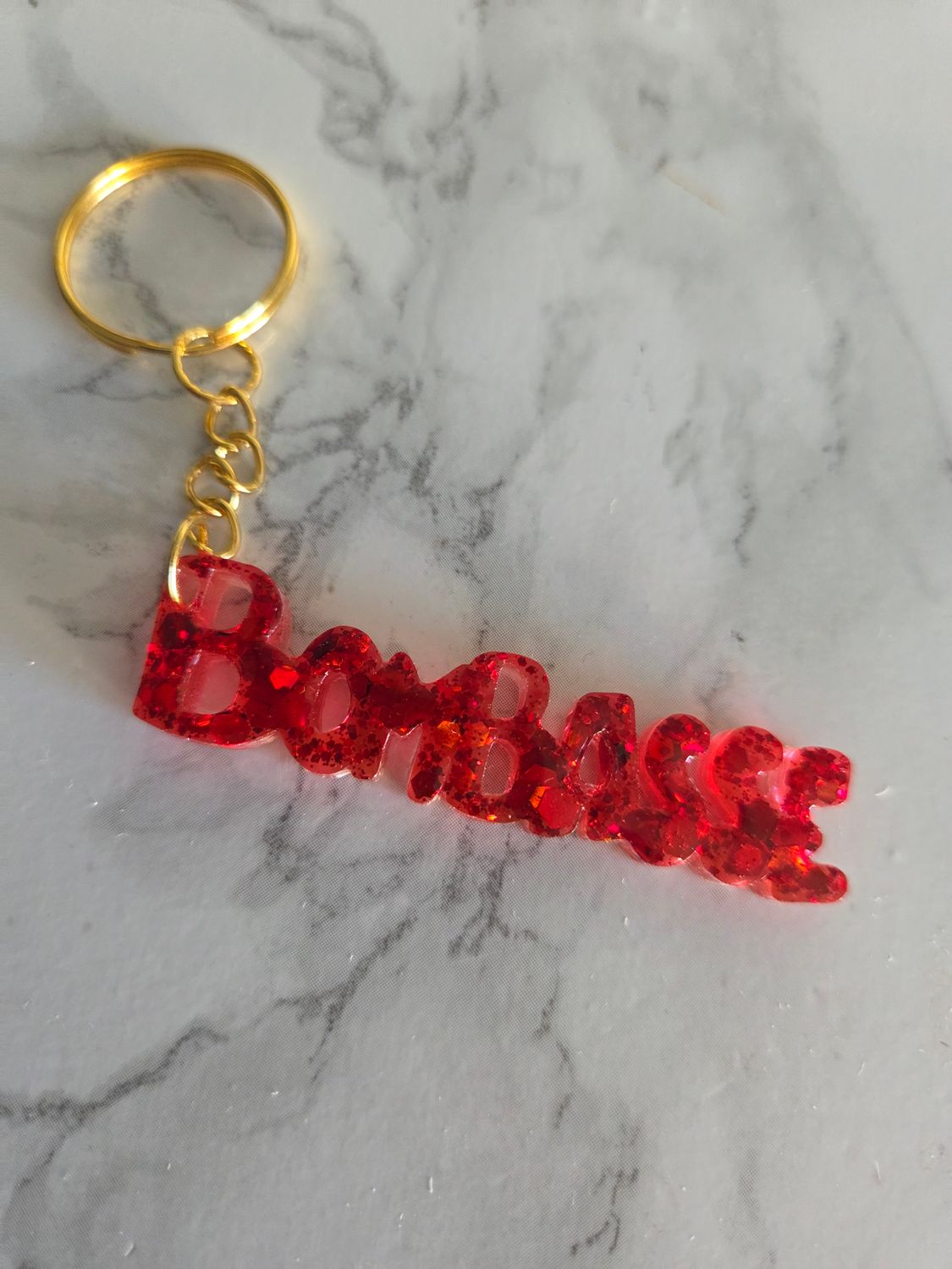 Porte clé bombasse paillettes rouges