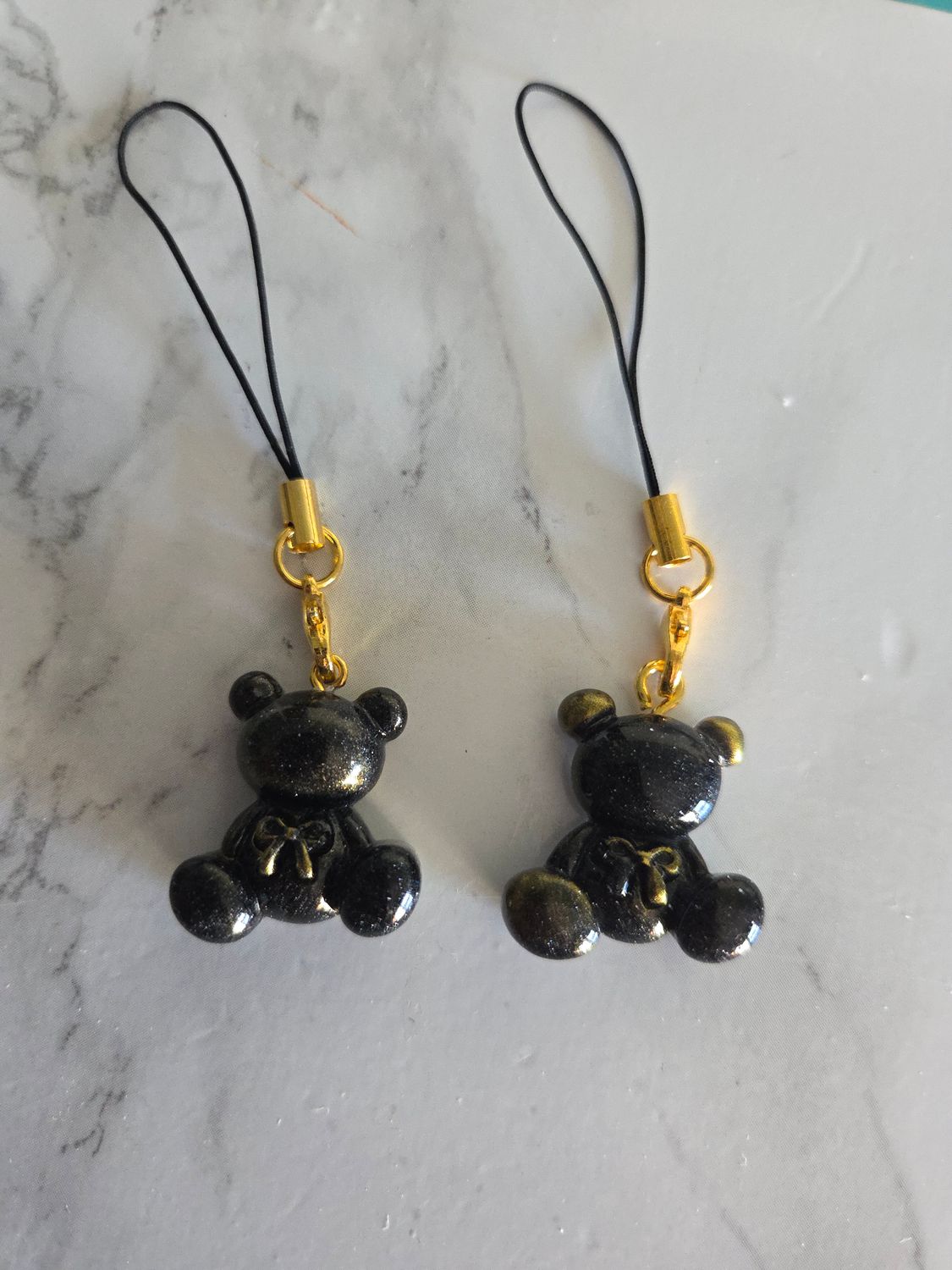 Bijou mini ourson noeud noir et or